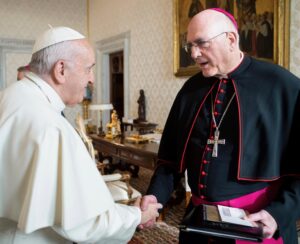 Archbishop Naumann visiting with Pope Francis
