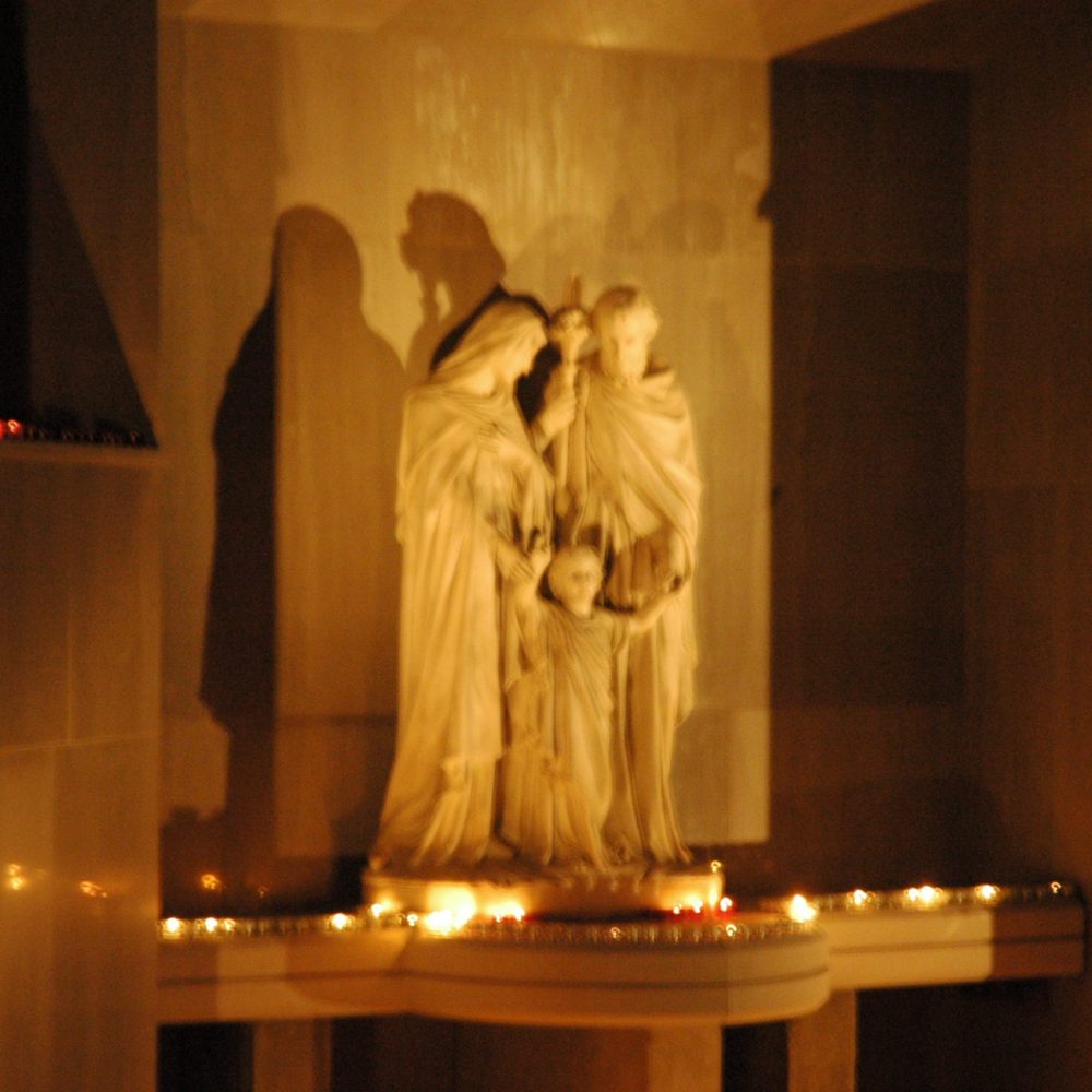 Holy Family grotto by candlelight