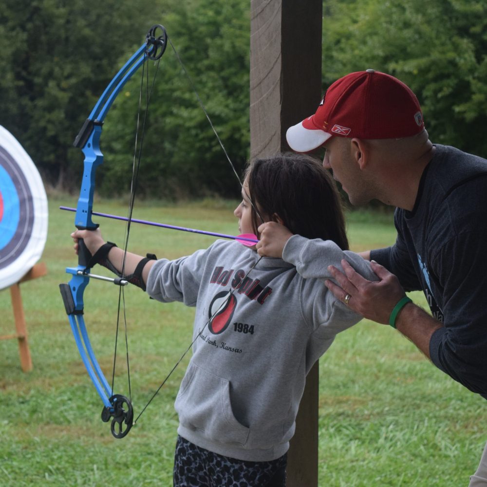 archery, dad and daughter